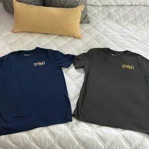 Lot of (2) size XL Under Armour fishing shirts in good condition.